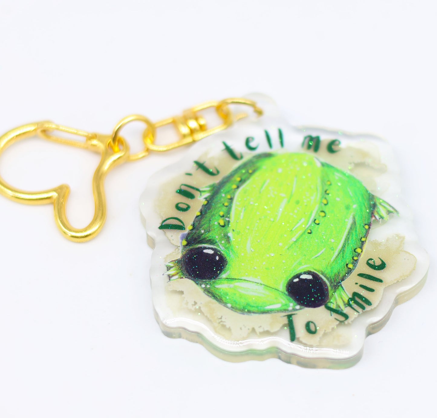 "Don't tell me to smile" Glumbert glitter keyring