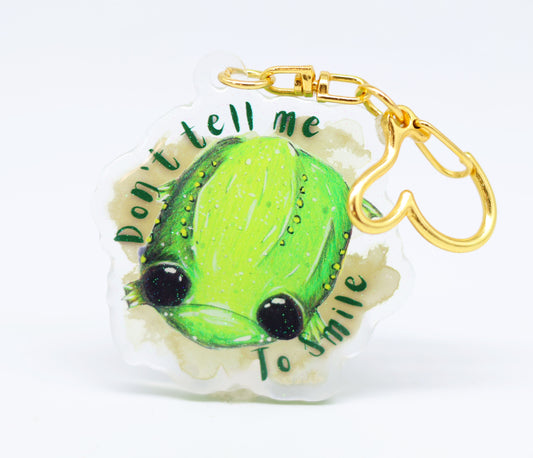 "Don't tell me to smile" Glumbert glitter keyring