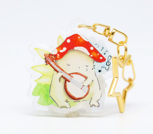 "The Bard" Mushie playing his banjo - glitter Keyring