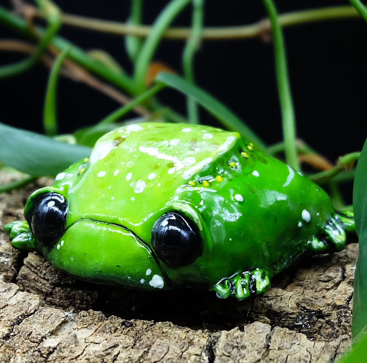 collectible figurine, sculpture of a sad toad / sad frog