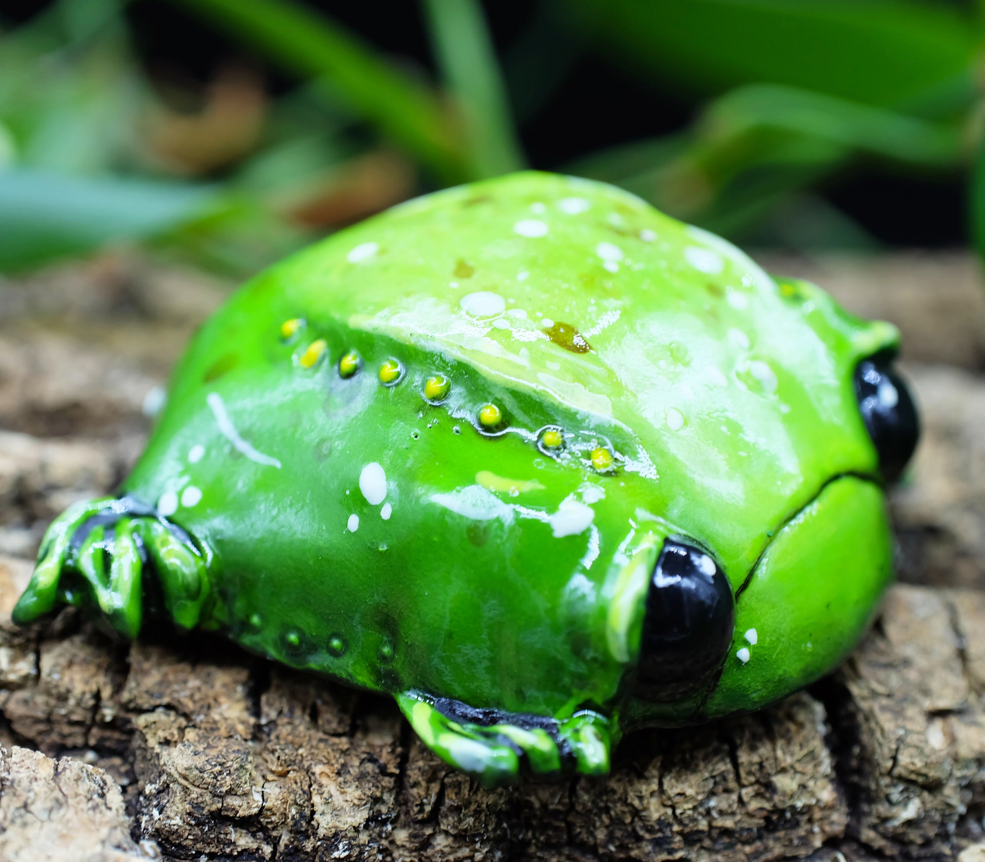 collectible figurine, sculpture of a sad toad / sad frog