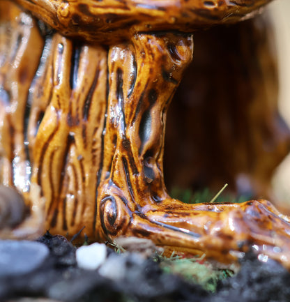 an extreme close up photo  of Splint's left leg, ankle and foot. The photo shows the contrast of paint which is picked up in his tree like details